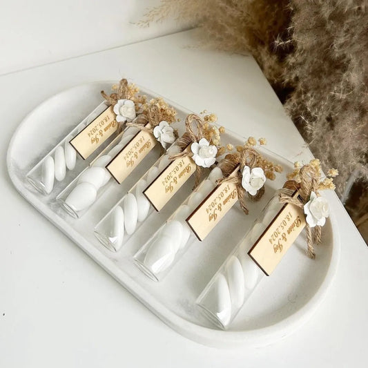 Colombe-Zuckermandeln als personalisiertes Gastgeschenk – liebevoll präsentiert und elegant