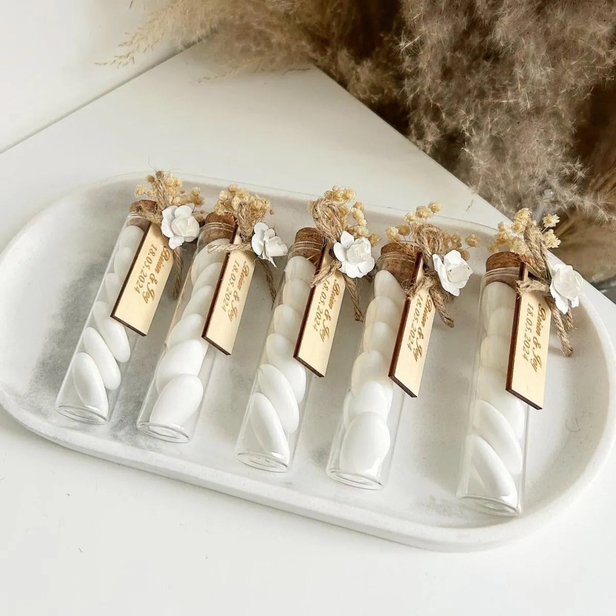 Colombe-Zuckermandeln als personalisiertes Gastgeschenk – liebevoll präsentiert und elegant